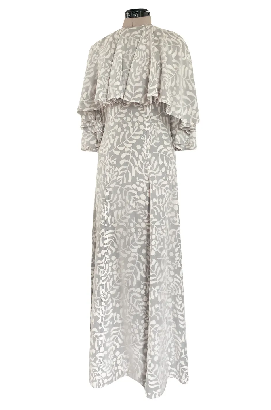 1970s James Galanos Soft Pale Grey & White Floral Print Silk & Silk Chiffon Caped Dress