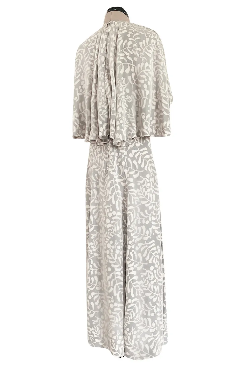1970s James Galanos Soft Pale Grey & White Floral Print Silk & Silk Chiffon Caped Dress
