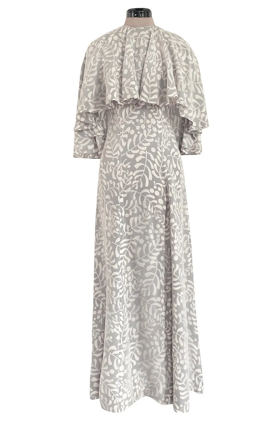 1970s James Galanos Soft Pale Grey & White Floral Print Silk & Silk Chiffon Caped Dress