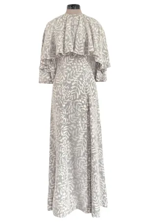1970s James Galanos Soft Pale Grey & White Floral Print Silk & Silk Chiffon Caped Dress