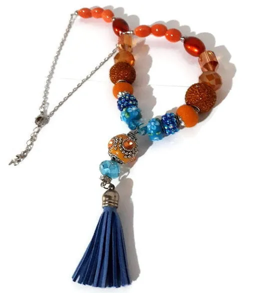 Blue leather tassel, statement beaded necklace, handmade necklace, boho chic style, The orange peacock necklace.