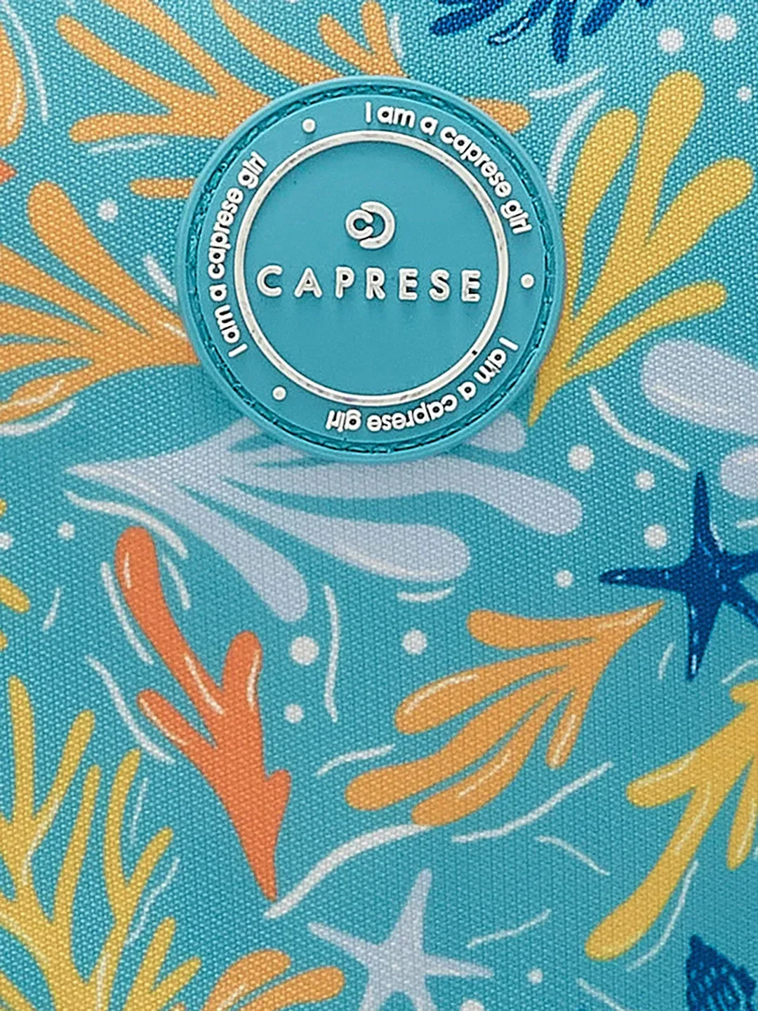 Caprese Xenia Small Turquoise Printed Backpack