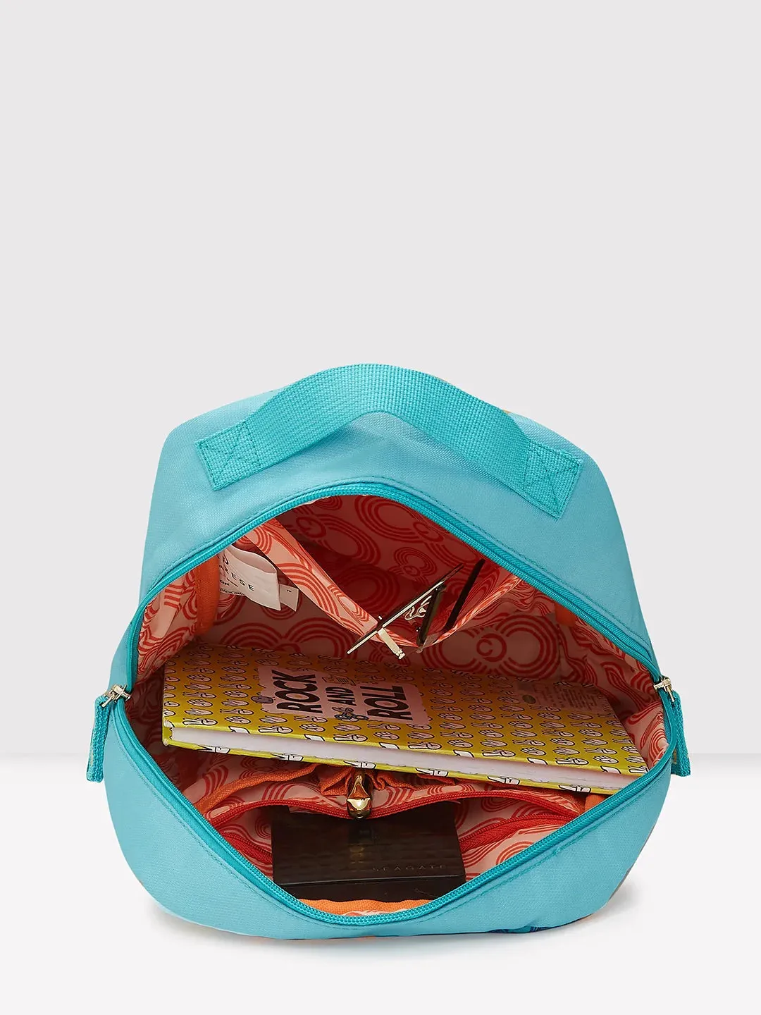 Caprese Xenia Small Turquoise Printed Backpack