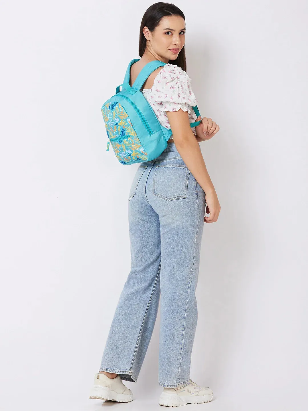 Caprese Xenia Small Turquoise Printed Backpack