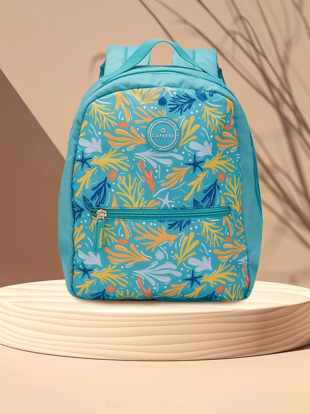 Caprese Xenia Small Turquoise Printed Backpack