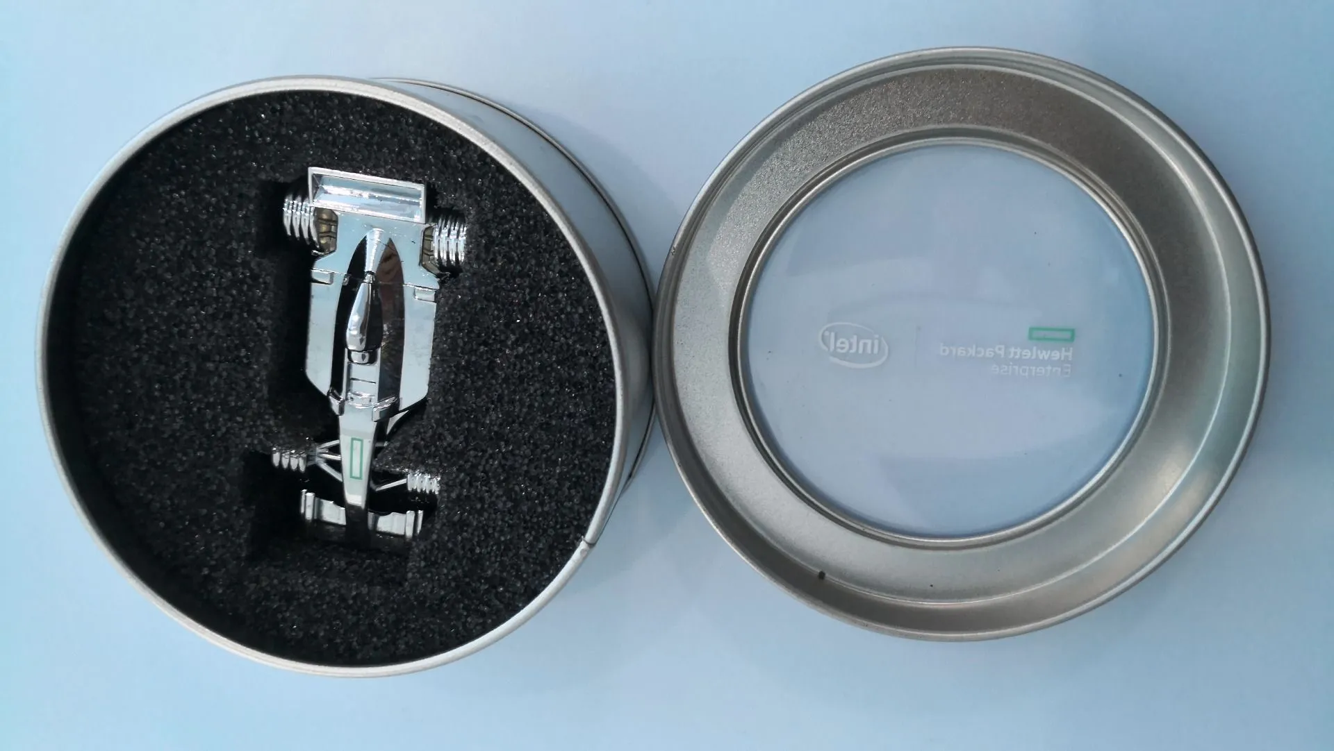 Chrome plated metal paper weight, Formula 1 racing car design