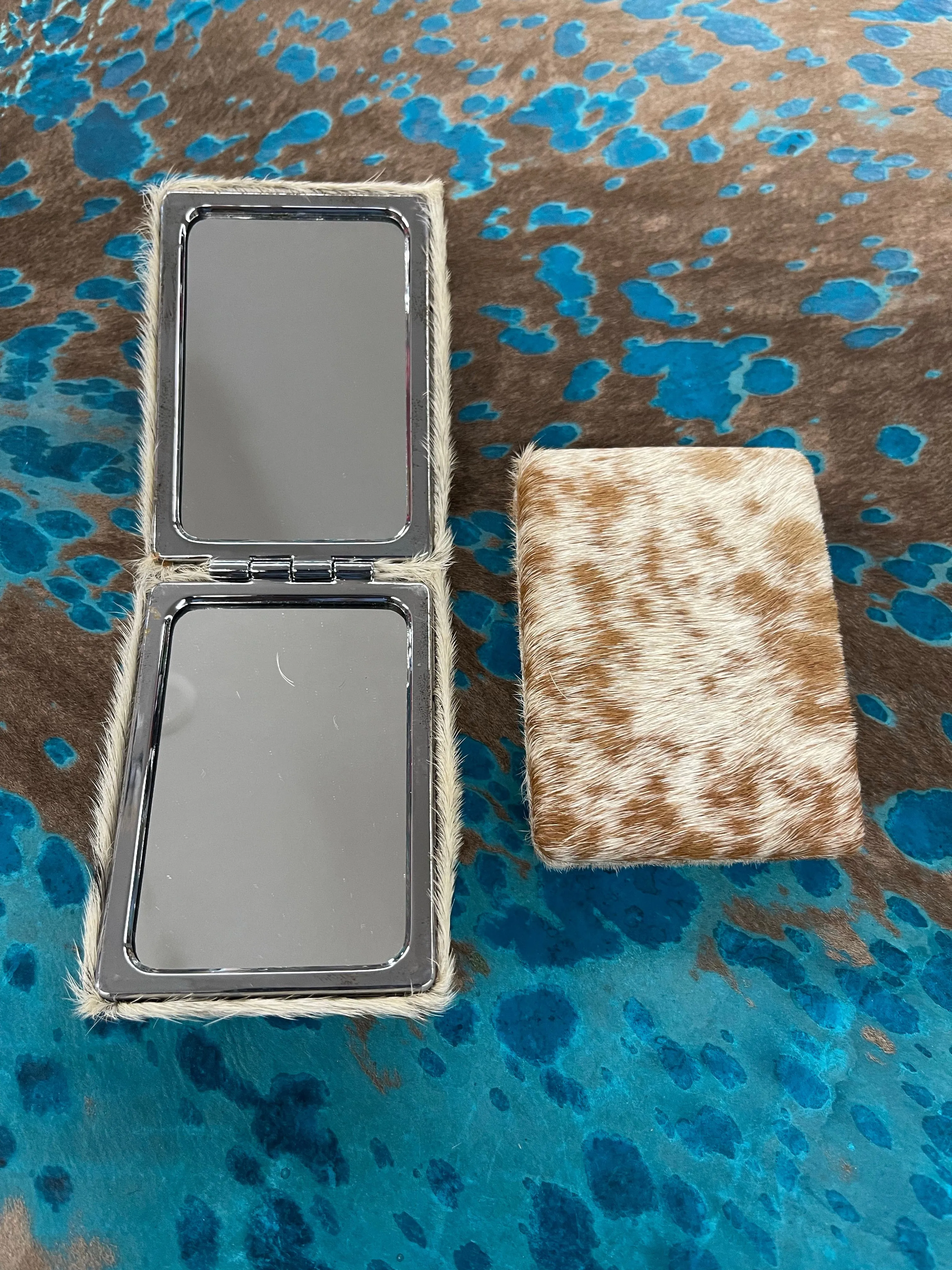 Compact cowhide mirror