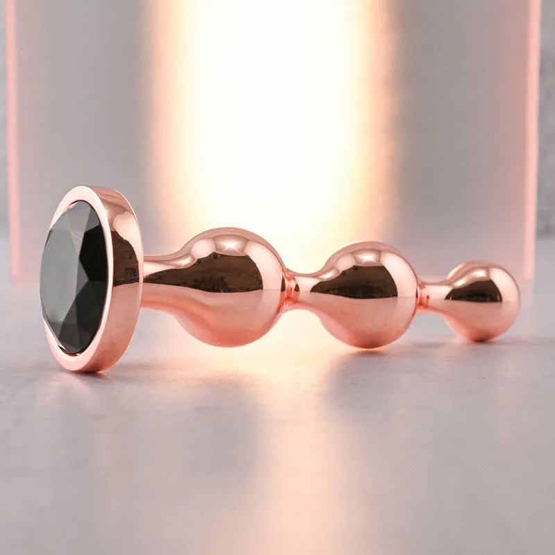 Gender X Gold Digger - Large Rose Gold Butt Plug with Black Gem Base