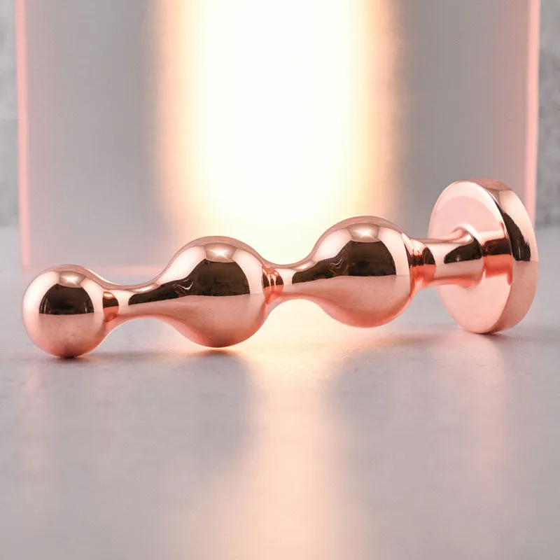 Gender X Gold Digger - Large Rose Gold Butt Plug with Black Gem Base