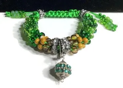 Green bracelet, Handmade green beaded Kumihimo wrap, woman size, macrame clasp, Boho-chic, The green mix bracelet
