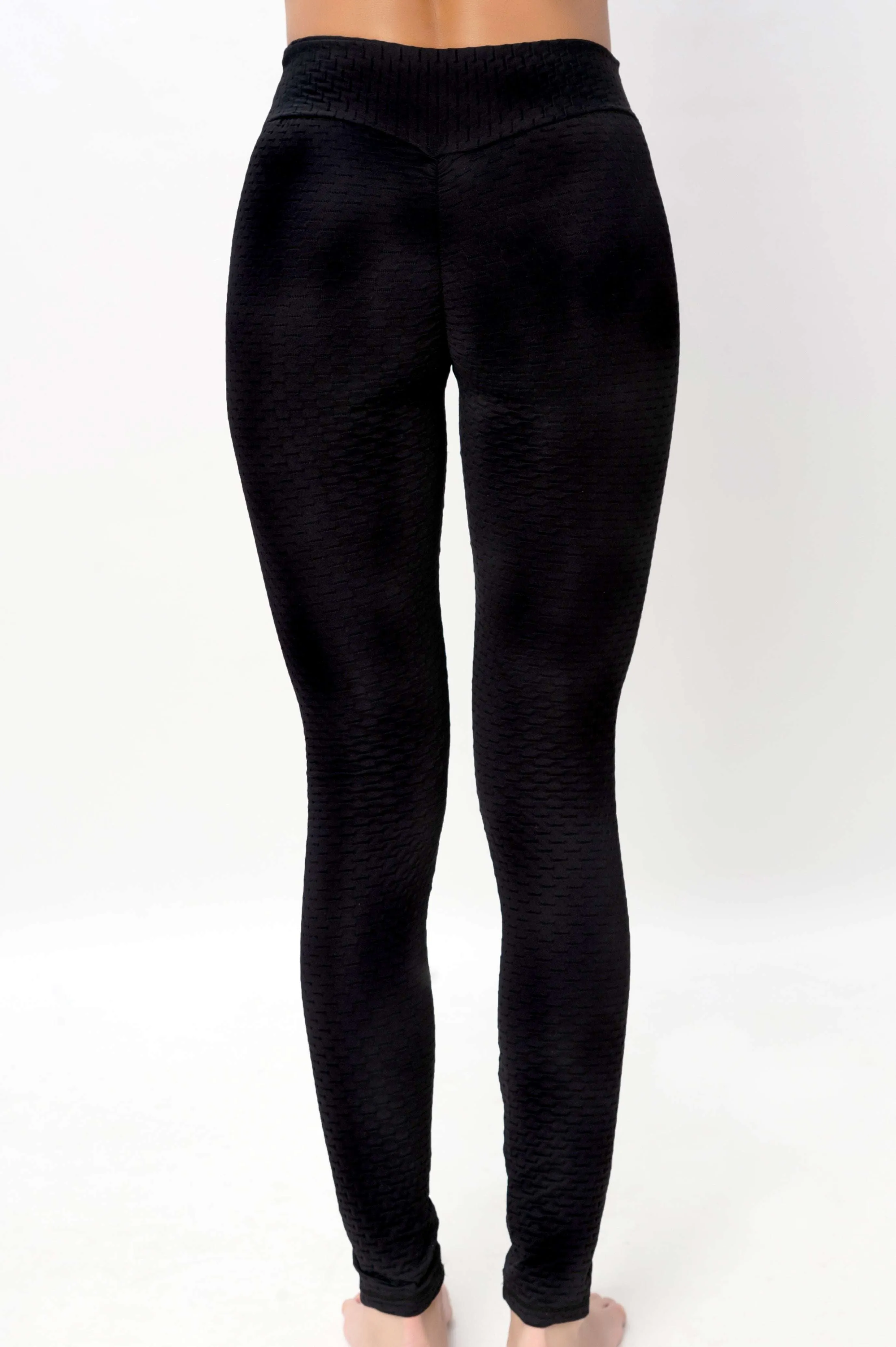 Legging casual negro con talle medio.