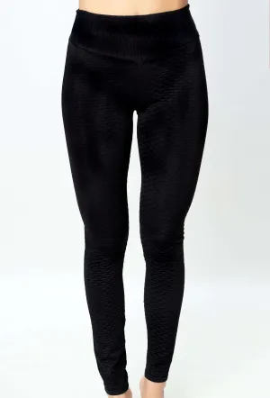 Legging casual negro con talle medio.
