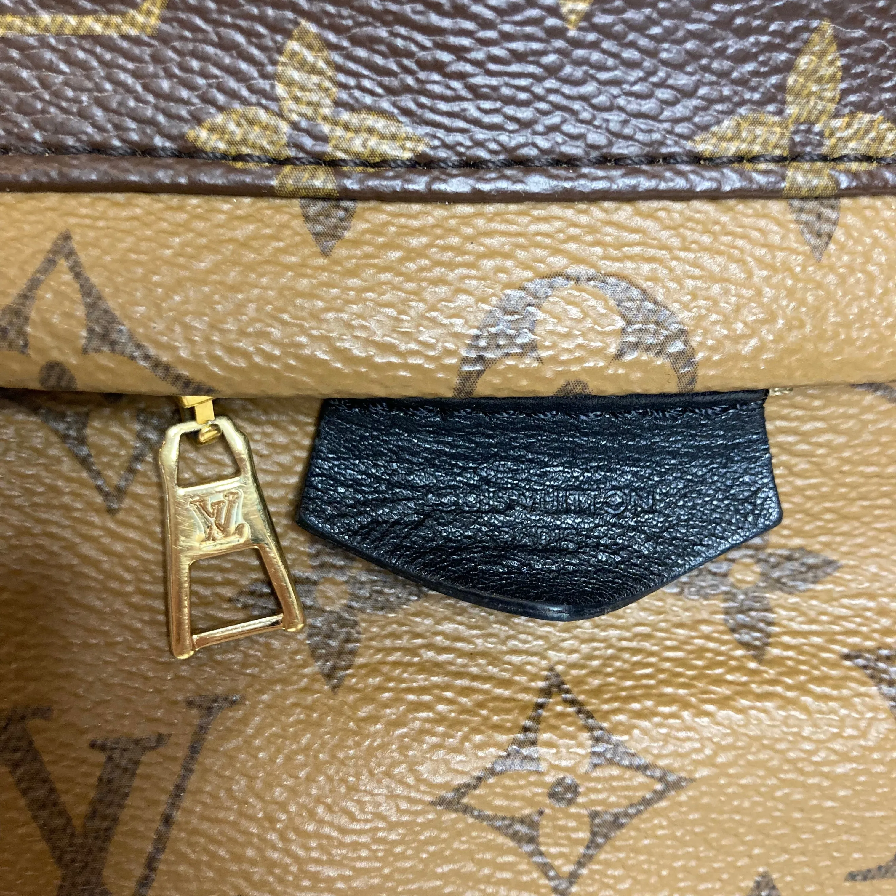 LOUIS VUITTON Reverse Monogram Palm Springs Backpack