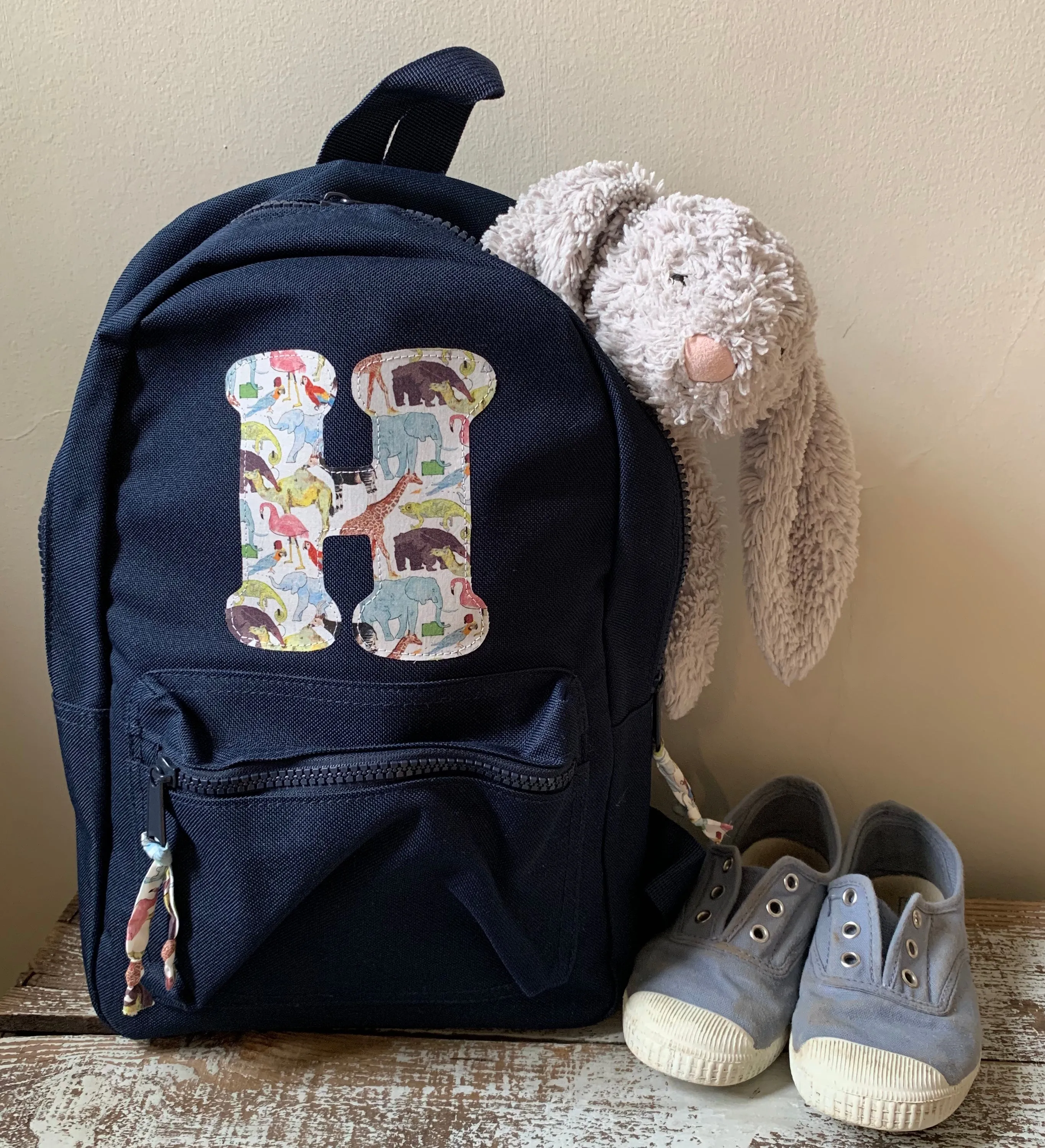 Navy initial backpack